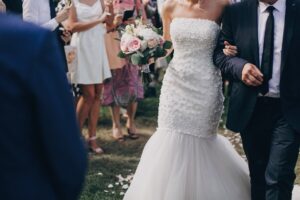 Outdoor bride walking down the aisle