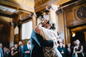 a son and his mom dancing to a mother son dance songs