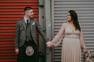 Barras Art and Design wedding Glasgow Barrowlands with bride wearing Anne Priscilla Bridal Watters Mercury dress and groom wearing McCalls kilt