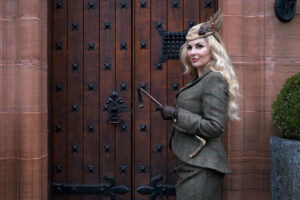 Model wears tweed suit jacket and matching skirt from the new Heritage collection sold at Bombshell London