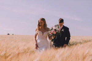 Tower Photography captures a couple walking through field