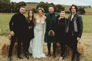 Wedding band GeO Gospel Choir are gathered outside to provide outdoor entertainment