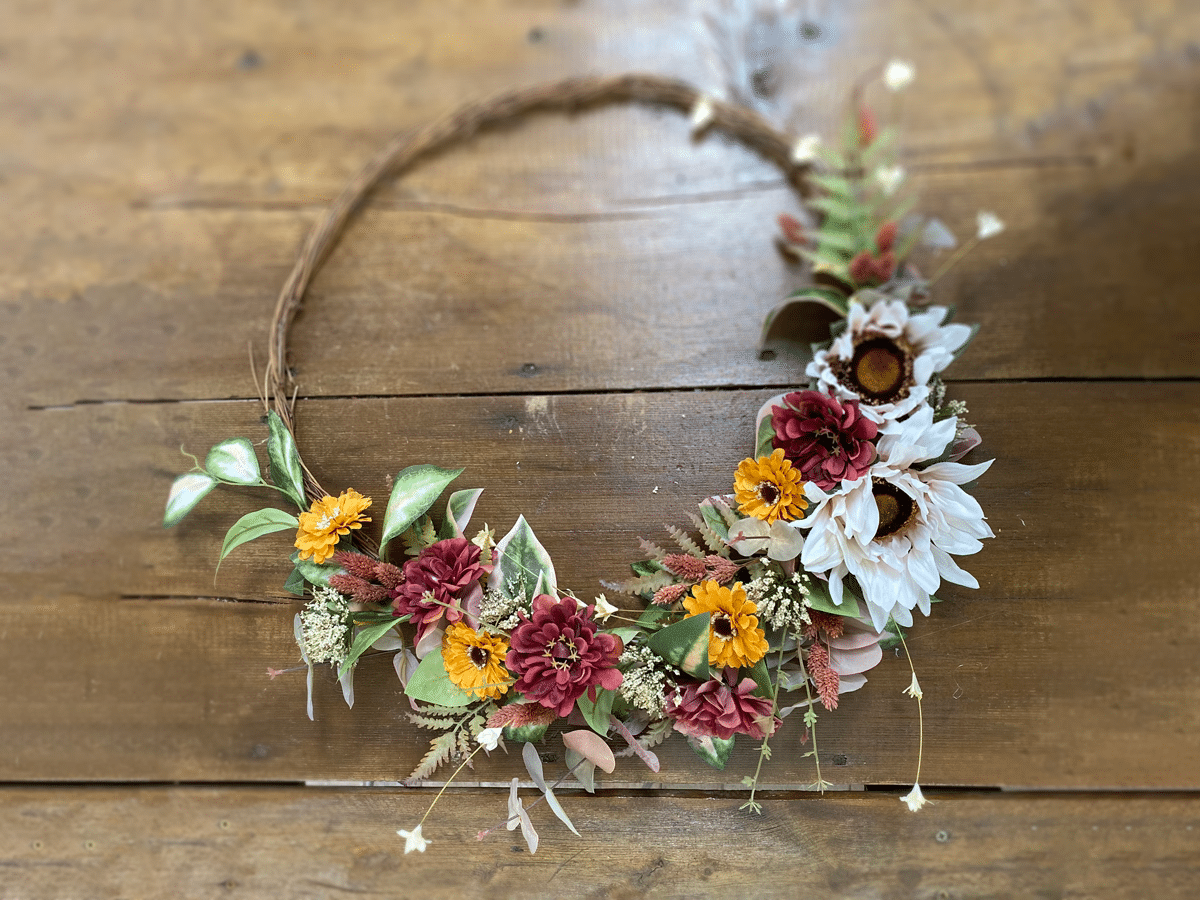 Learn how to make your own diy fall wreath with silk flowers for your home or wedding decor in this tutorial from Bloom Culture Flowers. 